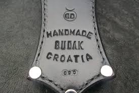 лого "творнице Будак" на кожној рукавици за "србосјек" - оружје за масовно клање Срба